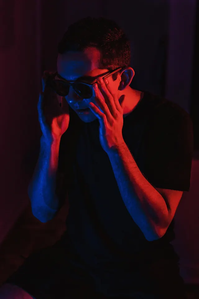 Cyberpunk Portrait with Neon Lighting, dark-mode, abstract, high-contrast