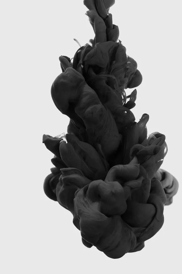 Abstract sculptural form in black against white, abstract, monochrome, dark