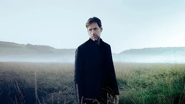 Cinematic Portrait in Foggy Field, minimal, photographic, muted