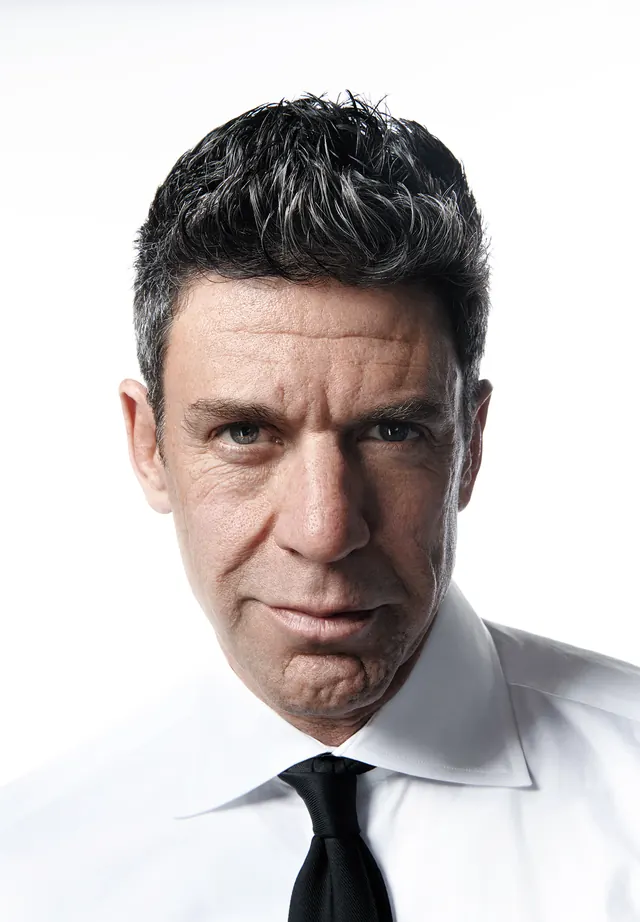 Portrait of a man in a white shirt, minimal, photographic, high-contrast