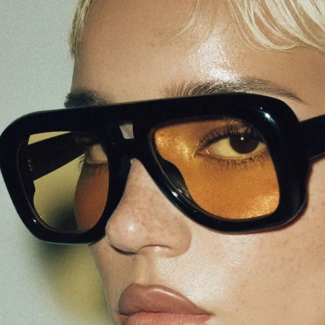 Close-up Portrait with Oversized Sunglasses, photographic, luxury, warm