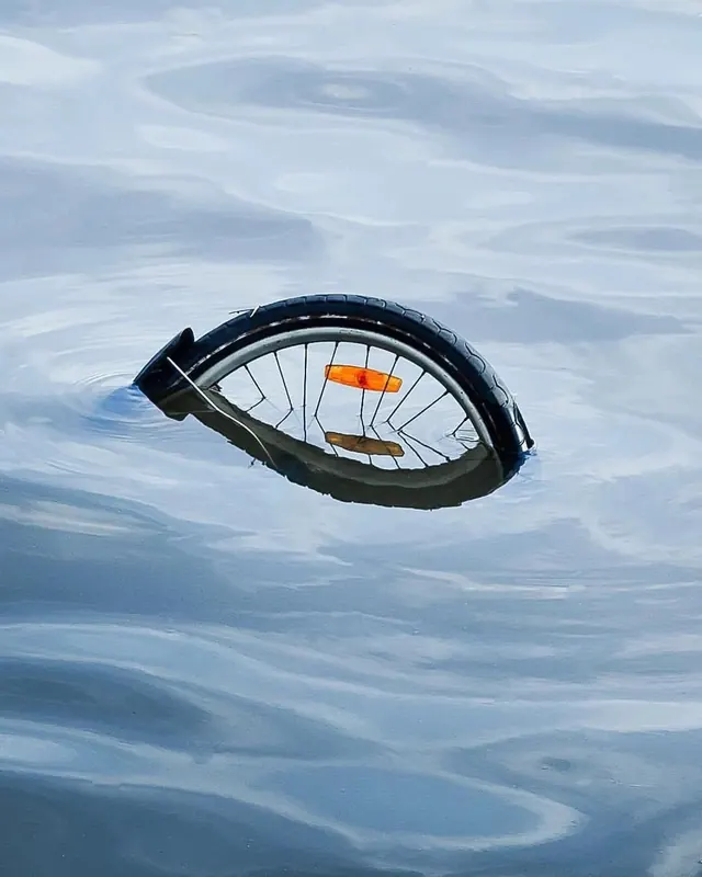 Floating Circular Object on Water, minimal, photographic, cool