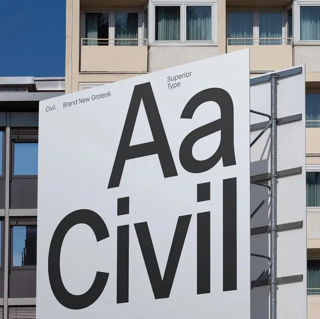 Large-scale architectural typography signage, minimal, technical, dark