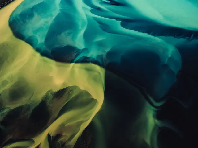 Flowing yellow and teal ink in water abstract, abstract, organic, vibrant