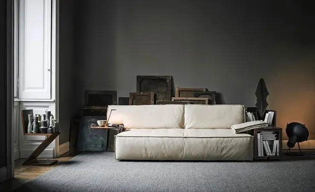 Minimalist interior with cream sofa and mixed materials, photographic, minimal, warm
