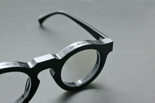 Eyewear product detail close-up, minimal, photographic, neutral