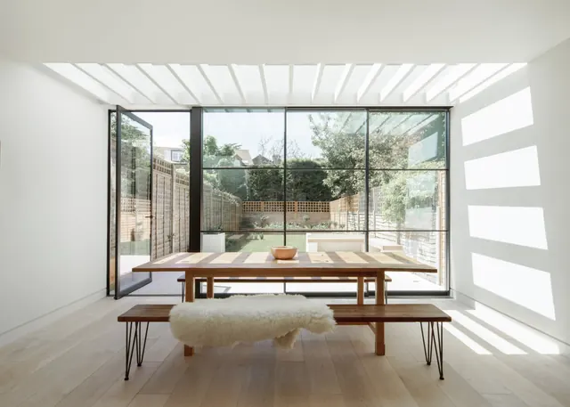 Light-filled minimalist dining space, minimal, photographic, light