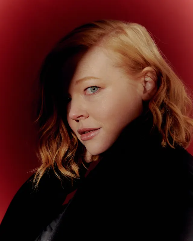 Portrait of a Woman with Red Background, photographic, minimal, high-contrast