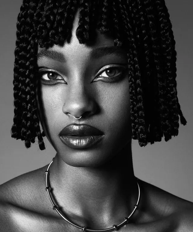 Black and white portrait with braids, photographic, minimal, monochrome