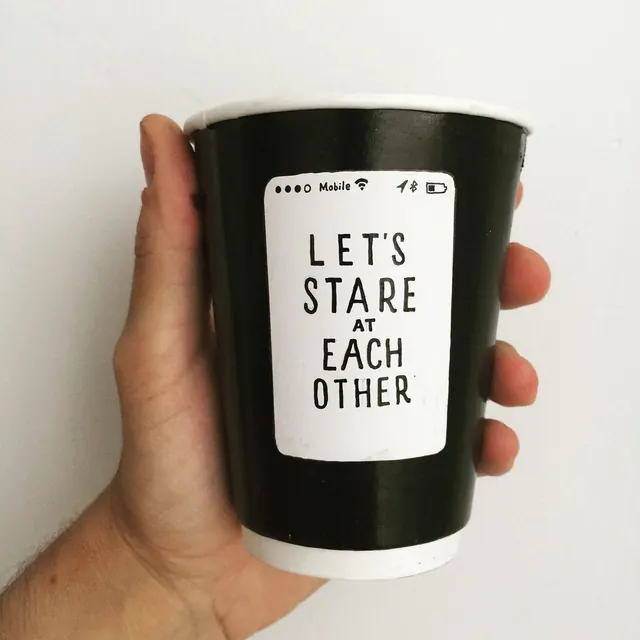 Monochrome mug mockup with playful text, playful, minimal, dark