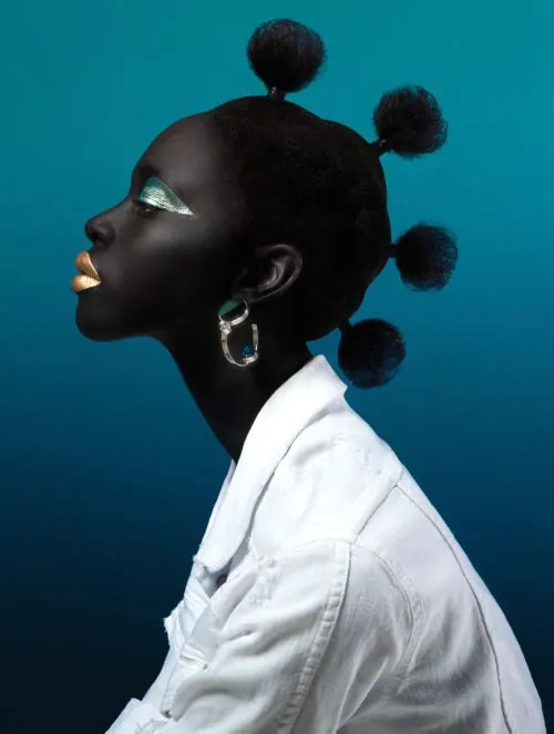 Profile portrait of woman with black skin and white shirt against teal background, photographic, vibrant, vibrant