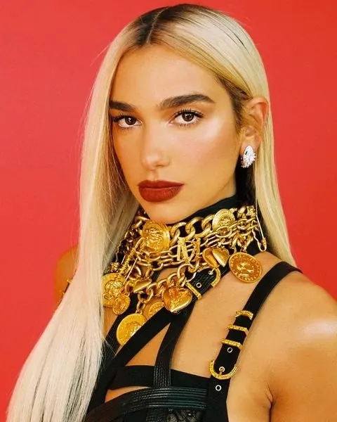 High-Fashion Portrait with Gold Jewelry, luxury, photographic, vibrant