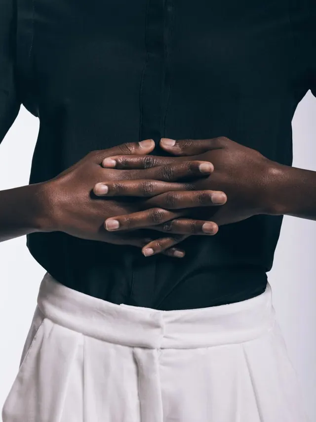 Man in Black Shirt and White Trousers, minimal, photographic, high-contrast