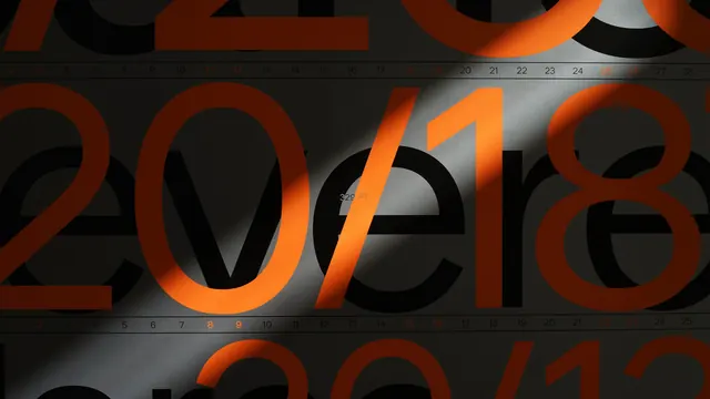 2018 calendar design with oversized orange numerals, technical, data-dense, warm