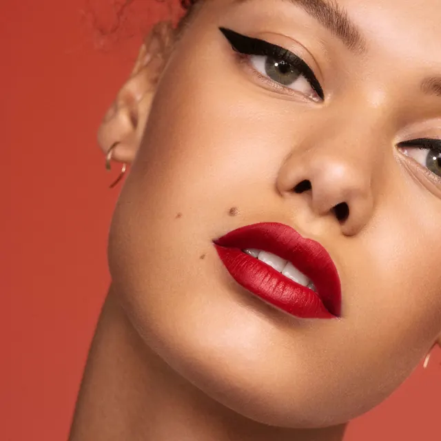 Red lipstick close-up product photography, photographic, minimal, vibrant