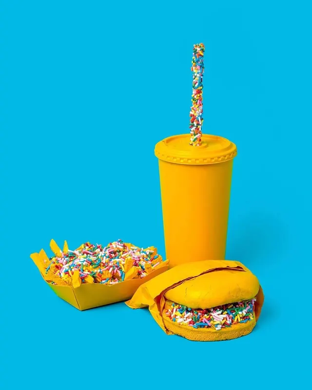 Playful food product mockup with bright yellow packaging, playful, 3d-render, vibrant