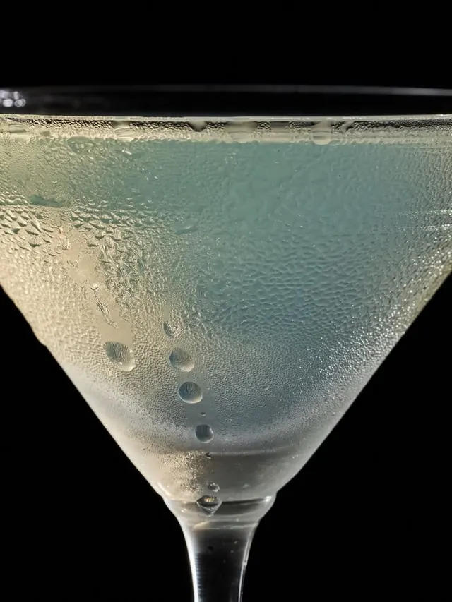 Textured liquid surface with bubbles, photographic, minimal, cool