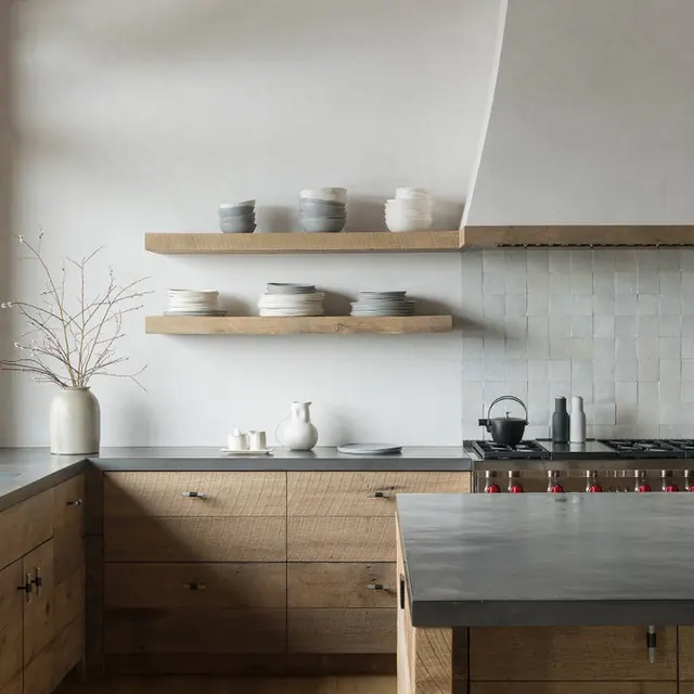 Contemporary kitchen design, corporate-clean, minimal, warm