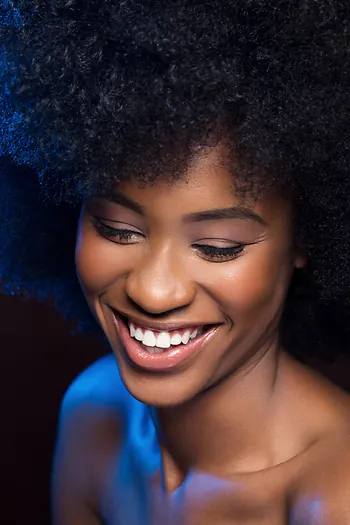 Portrait of a Smiling Woman, photographic, dark-mode, dark