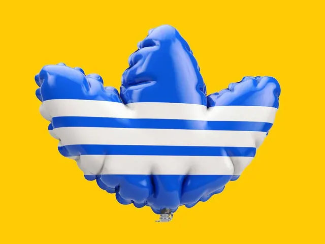 Blue balloon with striped band on yellow background, 3d-render, playful, vibrant