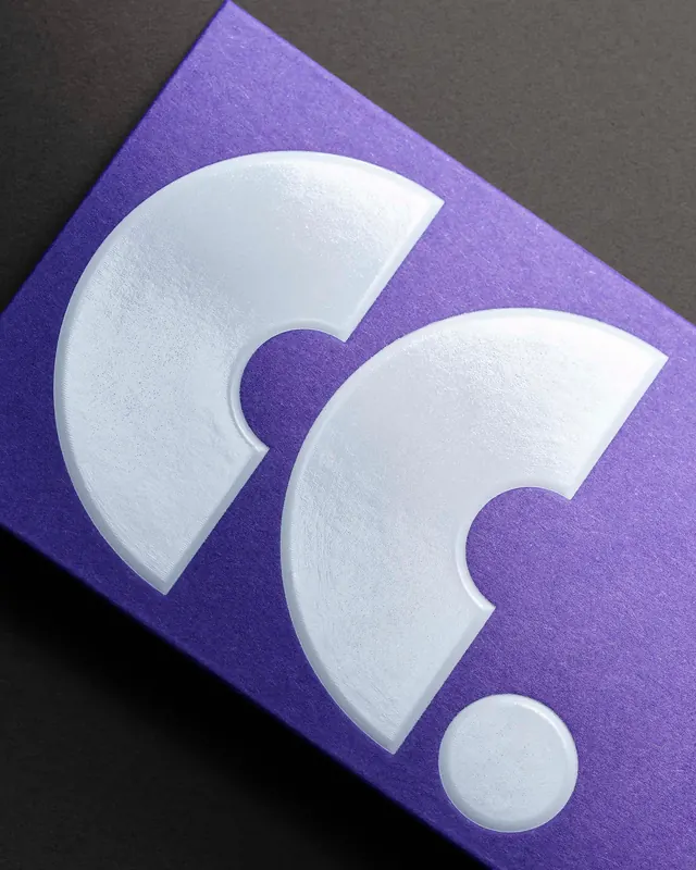 White question-mark punctuation on purple textured surface, 3d-render, geometric, vibrant