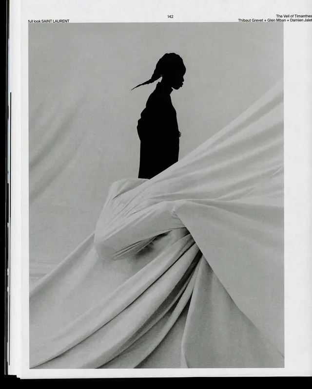 Fashion editorial silhouette with flowing fabric, photographic, editorial, monochrome