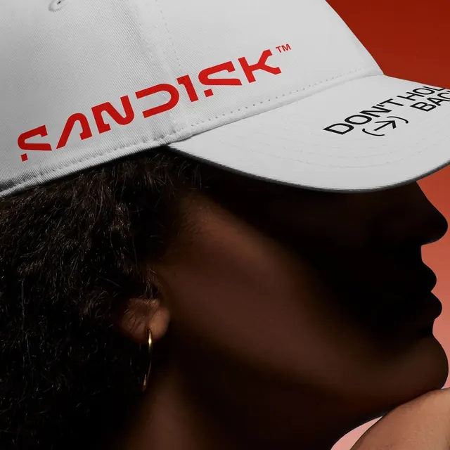 SanDisk red and white product shot, photographic, high-contrast, dark