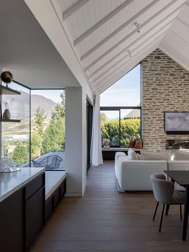 Contemporary architectural interior with mountain views, 3d-render, minimal, warm