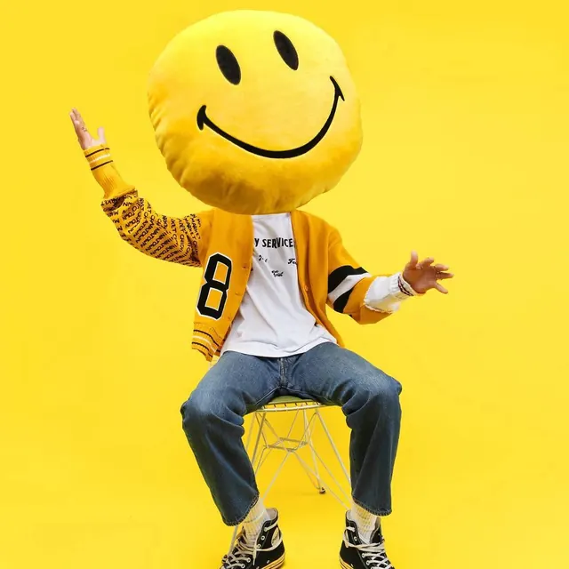 Yellow Smiley Mascot Character, playful, flat, vibrant