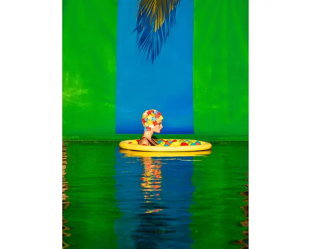 Surrealist Figure on Yellow Float, abstract, playful, vibrant
