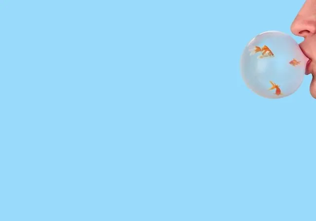 Goldfish in bubble with face, illustrated, playful, pastel