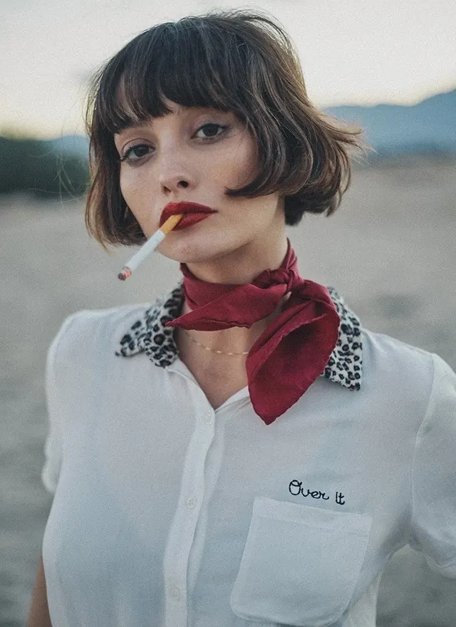 Over It" embroidered shirt campaign photo, photographic, retro, warm