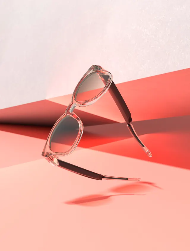 Sunglasses product photograph on pink gradient, photographic, minimal, pastel