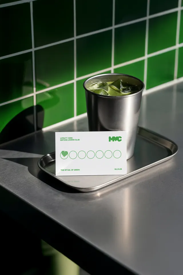 loyalty card design for matcha brand, minimal, photographic, dark