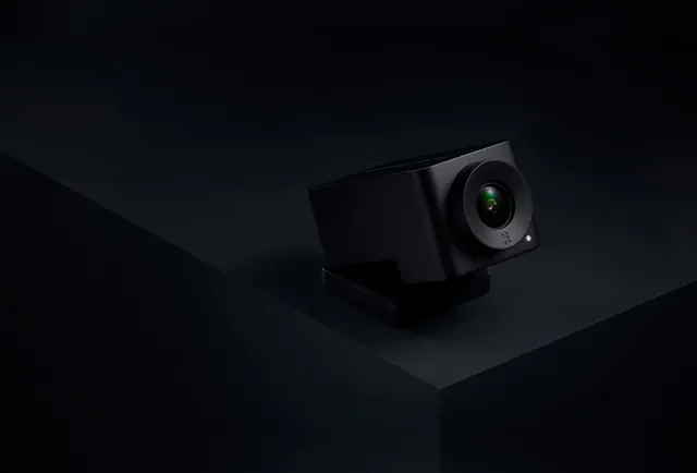Dark hardware product with subtle accent light, dark-mode, minimal, dark