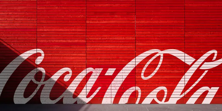 Coca-Cola Logo on Textured Wall, minimal, corporate-clean, vibrant