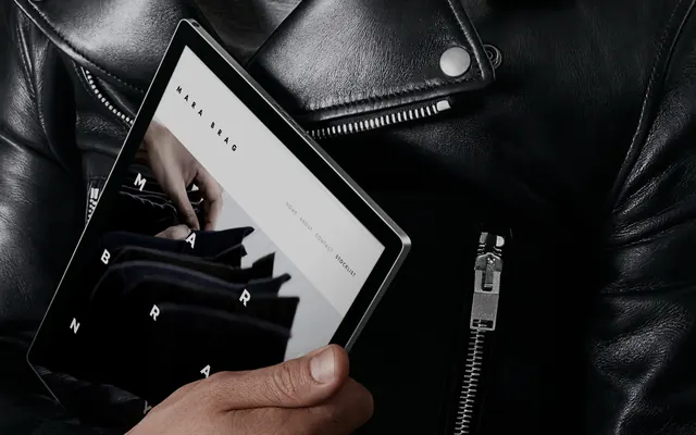 Tablet Mockup in Leather Jacket