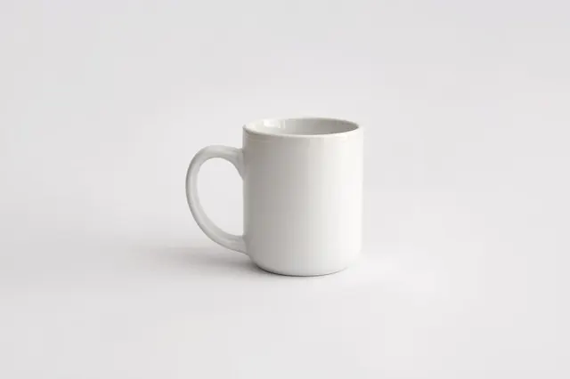 White cup with handle stock photo containing mug and milk, minimal, photographic, light