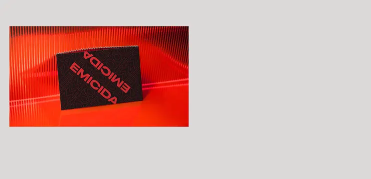 Red business card on ribbed pattern backdrop, playful, graphic, vibrant