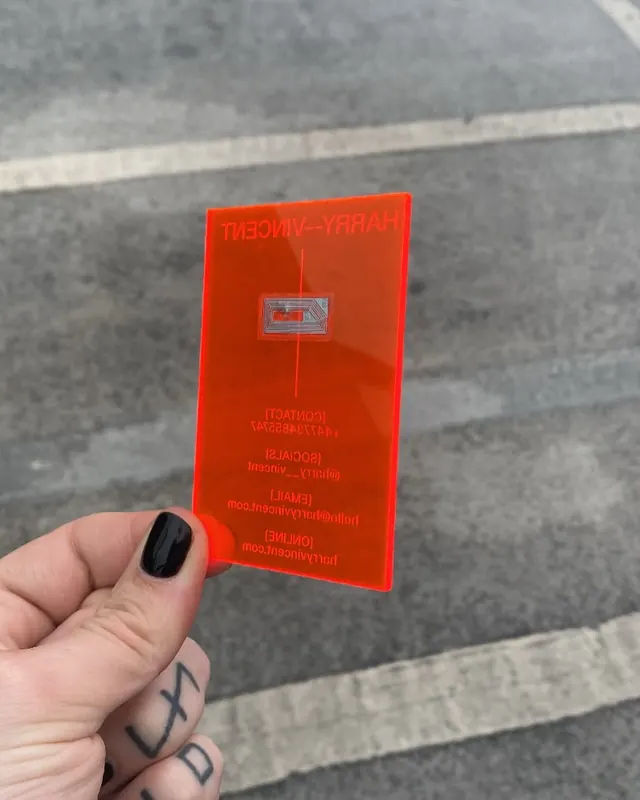 NFC-embedded translucent red contact card system (slide 8), minimal, technical, monochrome