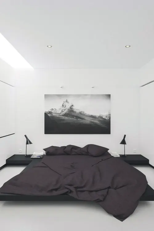 Modern minimal bedroom with black bed and mountain photography, photographic, minimal, monochrome
