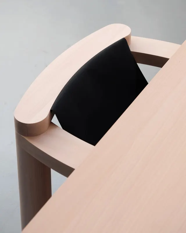 Minimalist curved beige armchair, minimal, 3d-render, warm