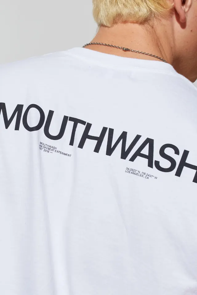 Oversized text graphic t-shirt back print, minimal, typography-focused, light