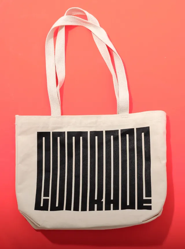 Tote bag packaging with bold typography, minimal, bold, vibrant