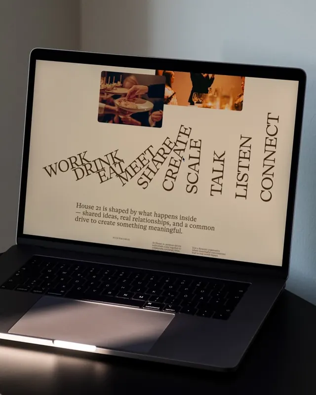 House 21 branding on laptop, editorial, minimalist, dark