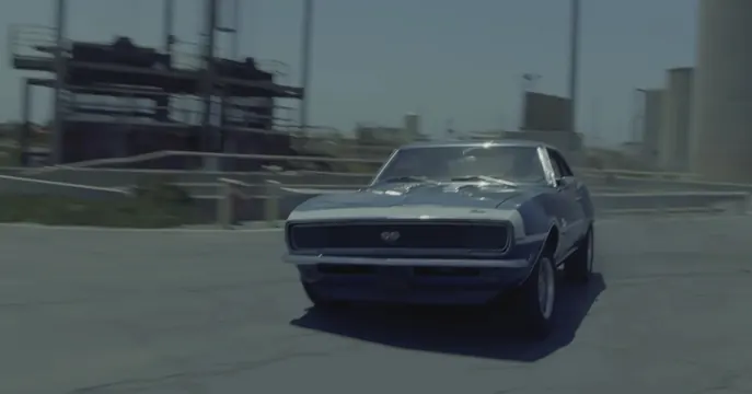 Blue Camaro industrial motion still, photographic, retro, cool