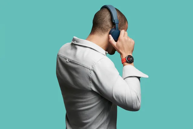 Man with headphones and smartwatch product shot, photographic, minimal, vibrant
