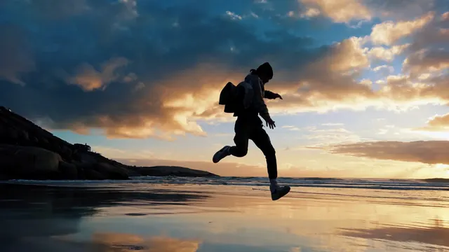 Beach Jump at Sunset, photographic, dark