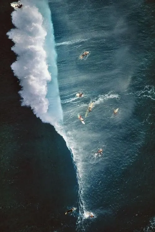 Aerial surfers on breaking wave, photographic, abstract, cool