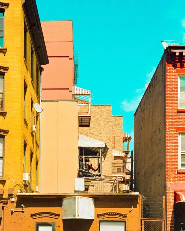 Colorful urban building facades, photographic, maximalist, vibrant